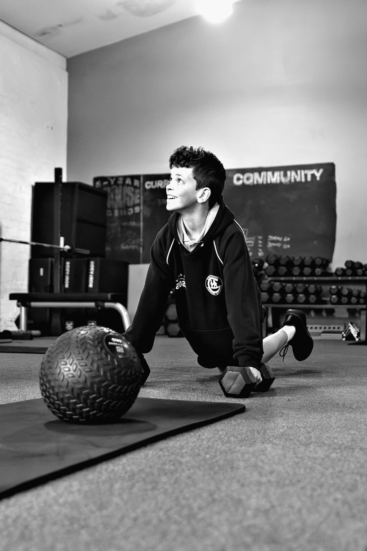 An athlete training with a med ball