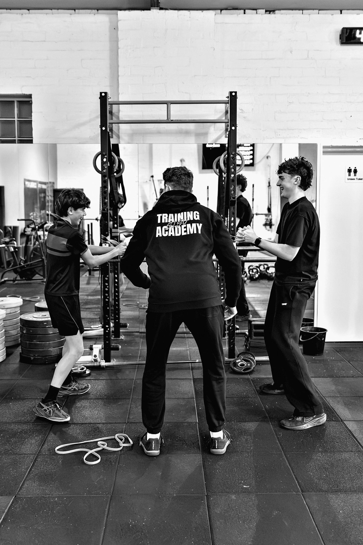 Coaching a lift at the rack